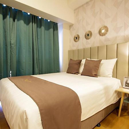Siglo Suites @ The Acqua Private Residences マンダルヨン・シティ エクステリア 写真