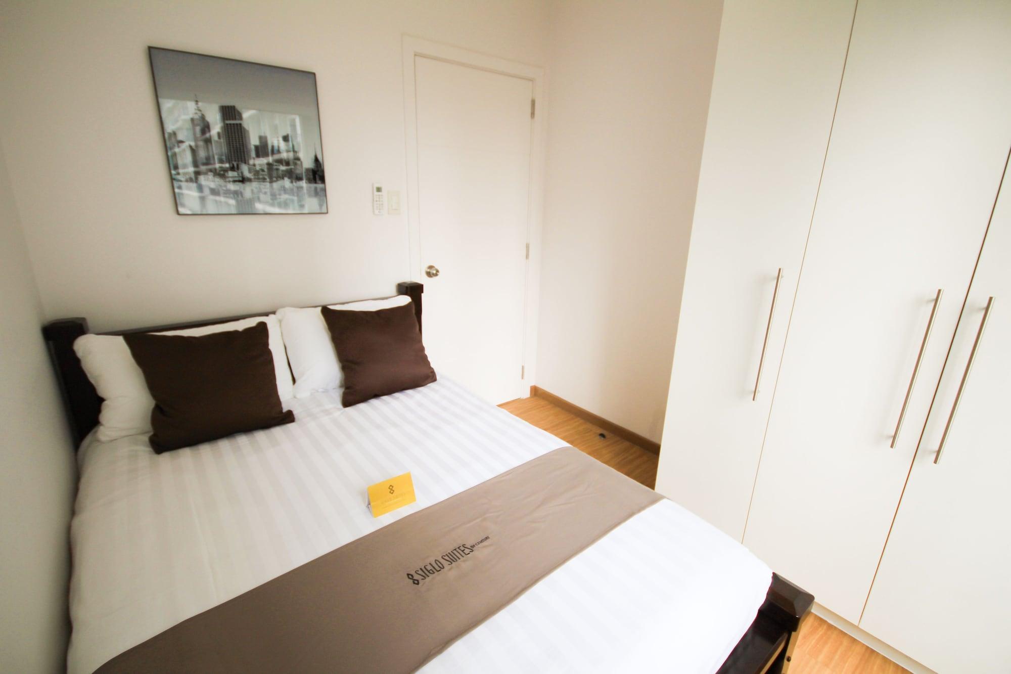 Siglo Suites @ The Acqua Private Residences マンダルヨン・シティ エクステリア 写真