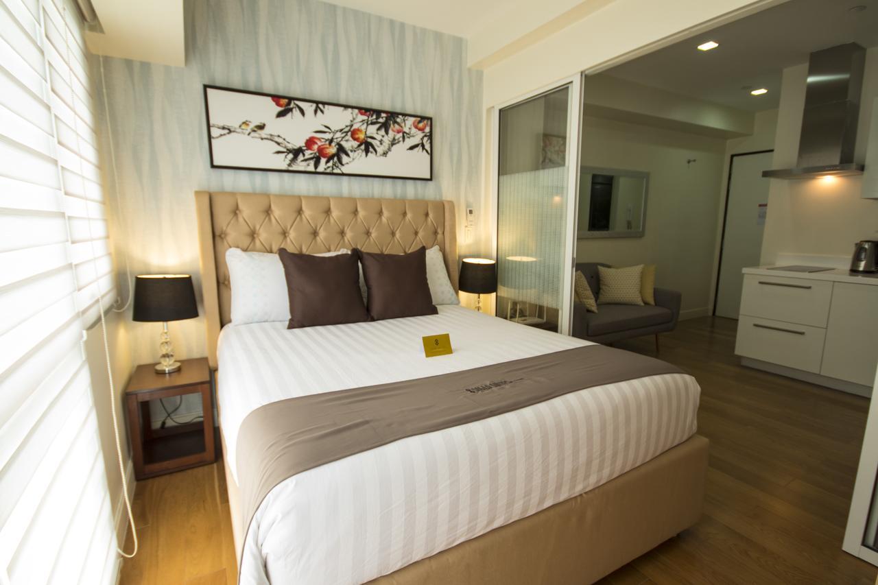 Siglo Suites @ The Acqua Private Residences マンダルヨン・シティ エクステリア 写真