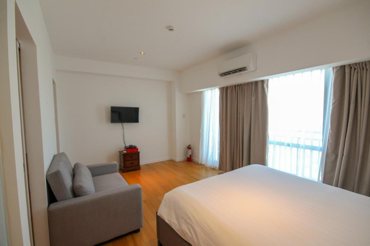 Siglo Suites @ The Acqua Private Residences マンダルヨン・シティ エクステリア 写真